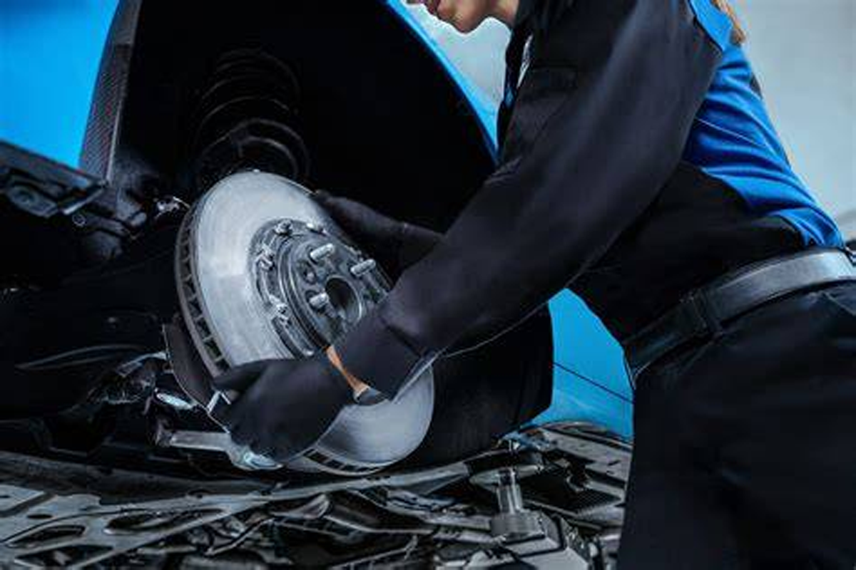 Certified technicians performing precision brake service at Auto Airbag & Electrical Specialist.